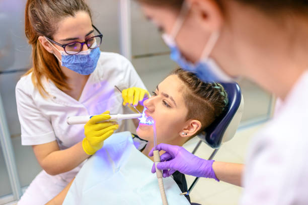 Dentistry dentist working teeth whitening dental medical process